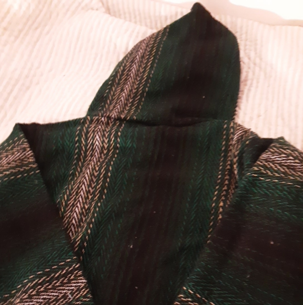 A green non-zip sweater